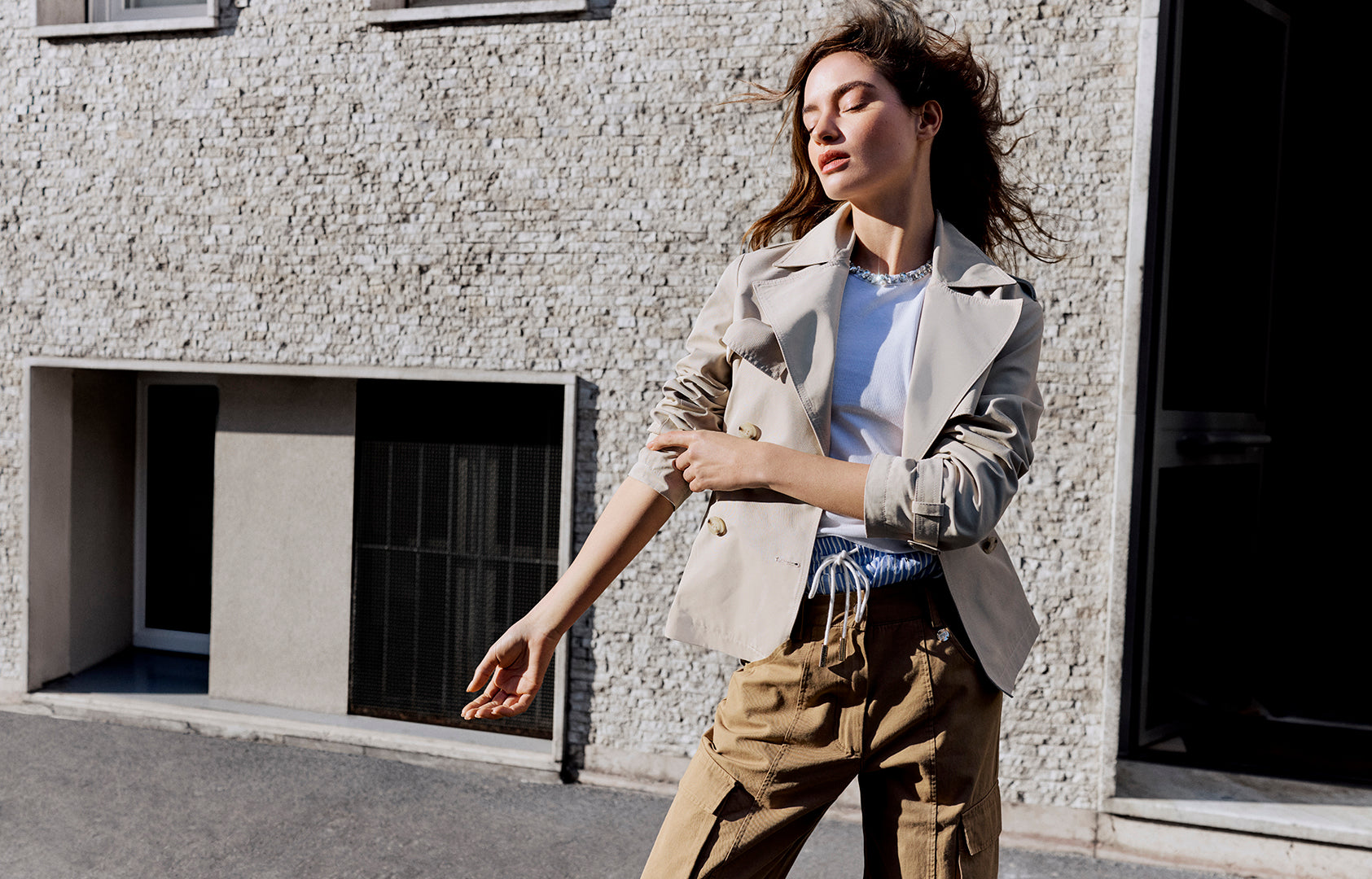 Short double-breasted trench coat with a refined design