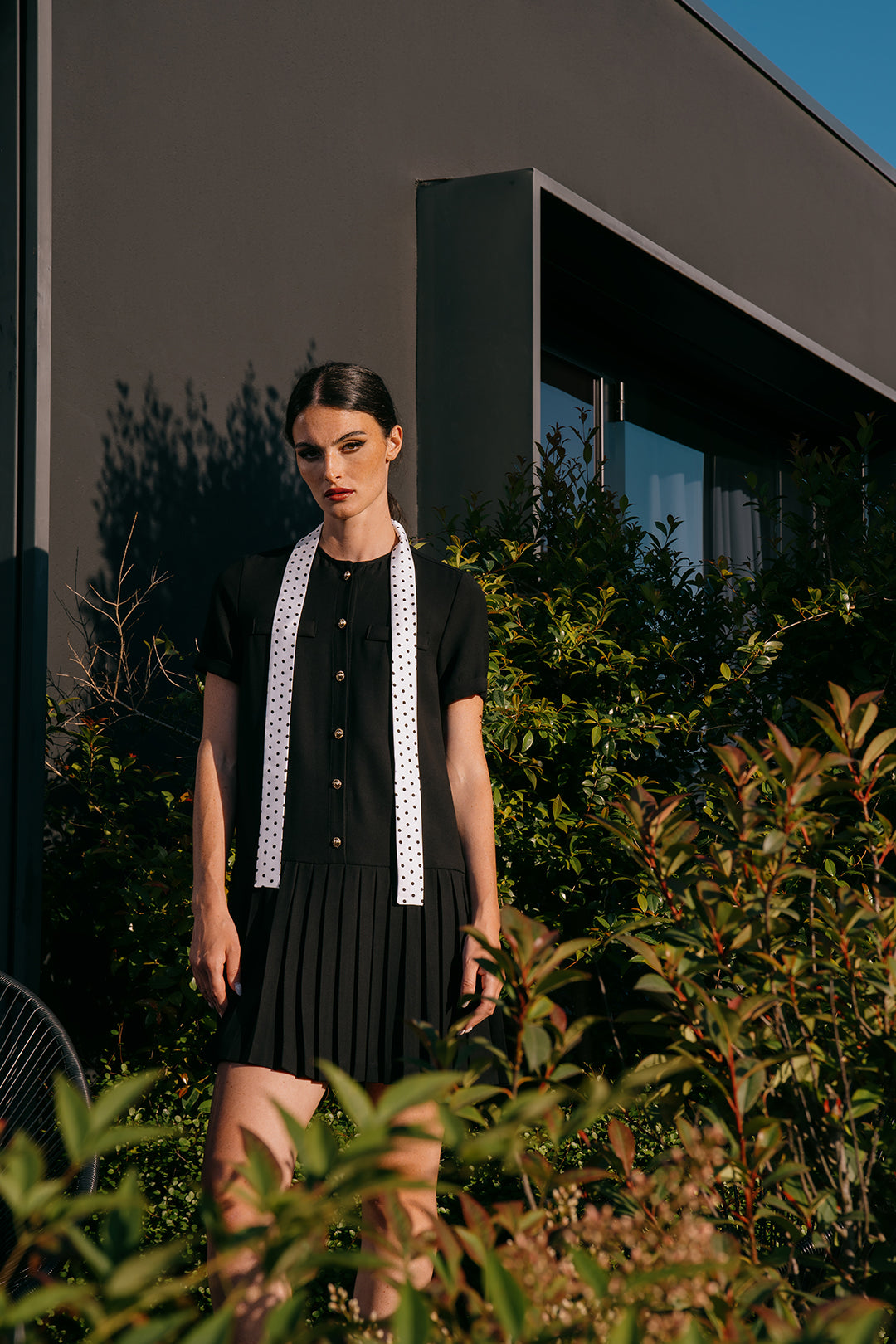 Dress with scarf detail and contemporary design