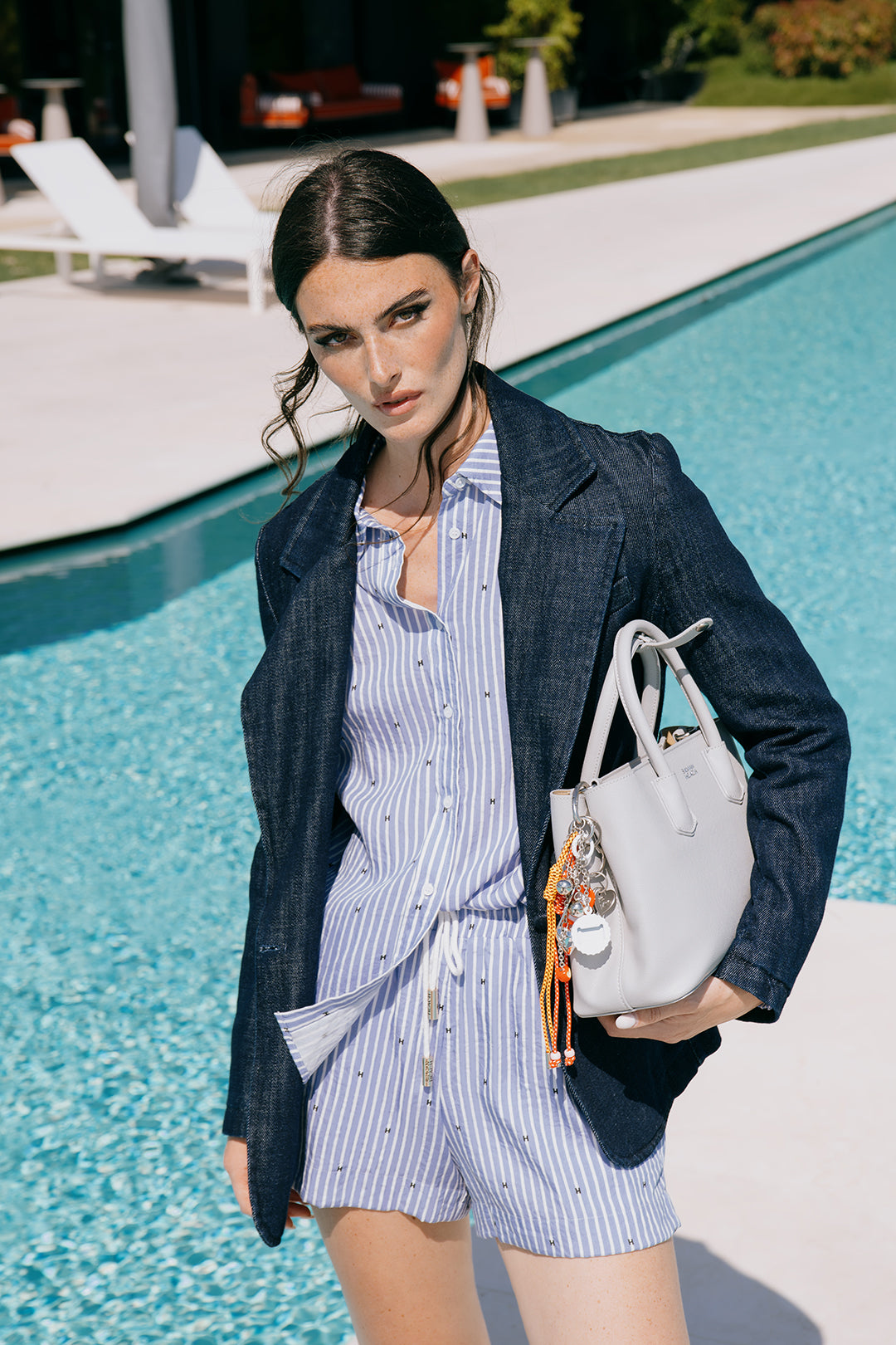 Shorts with striped pattern and graphic details