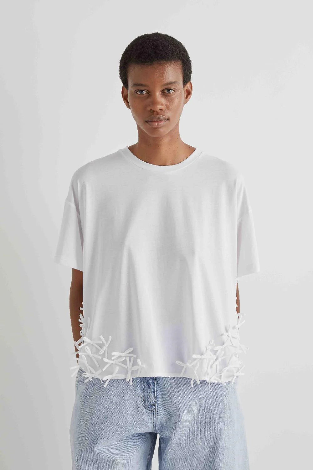 T-SHIRT with bows applied on the hem