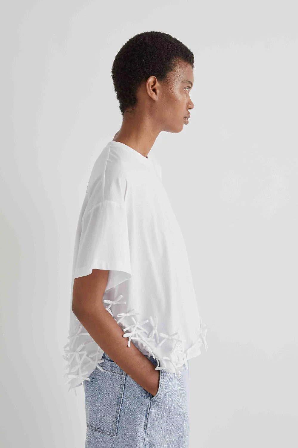 T-SHIRT with bows applied on the hem